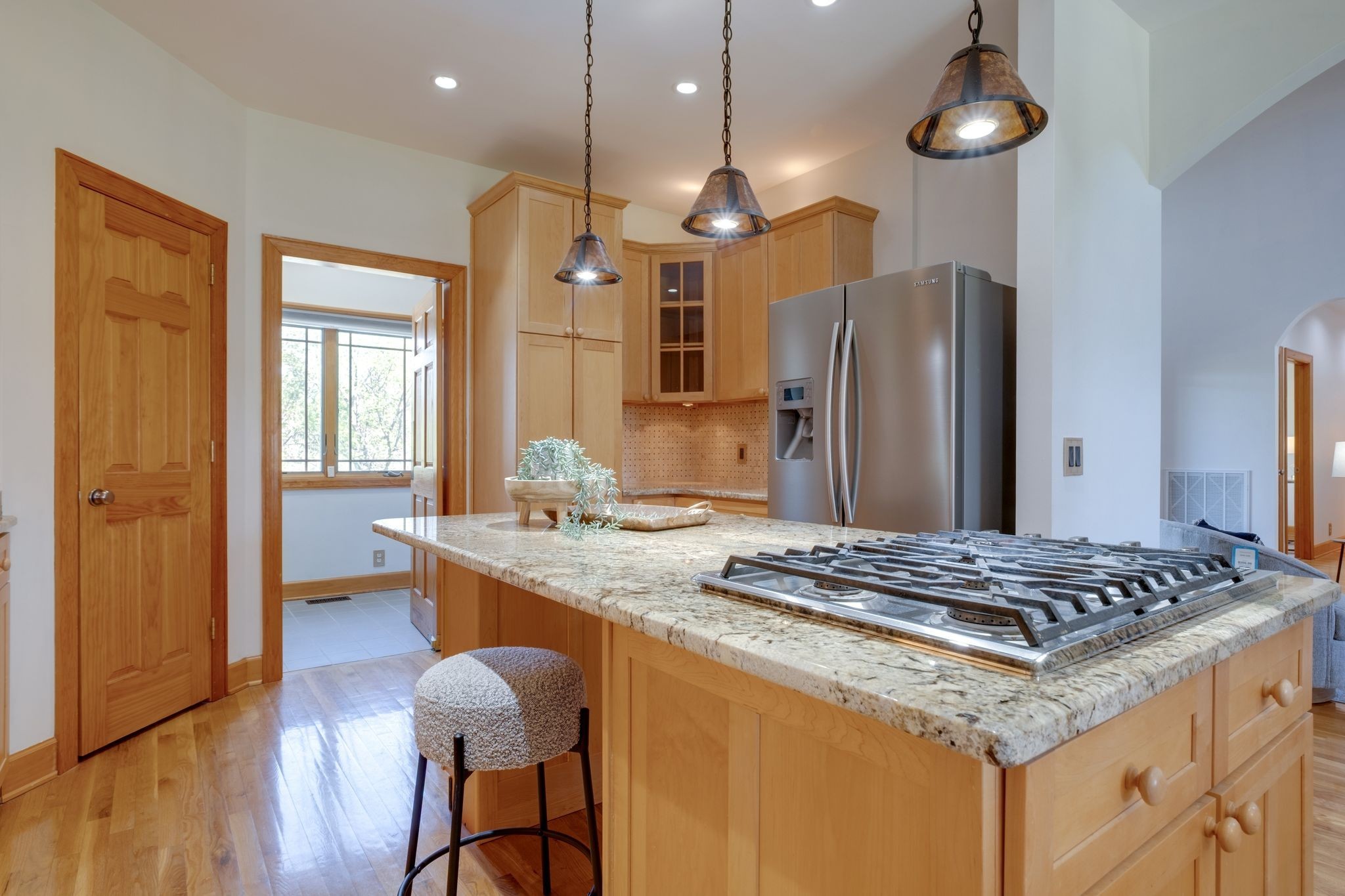 1249 White Road Bon Aqua, TN 37025 - Photo 19 of 60 a kitchen with stainless steel appliances granite countertop a stove refrigerator and wooden floor