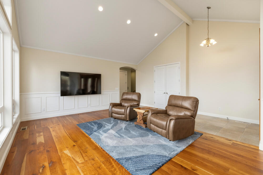 6586 Cooper's Hawk Road Klamath Falls, OR 97601 - Photo 10 of 68 a living room with furniture and a flat screen tv