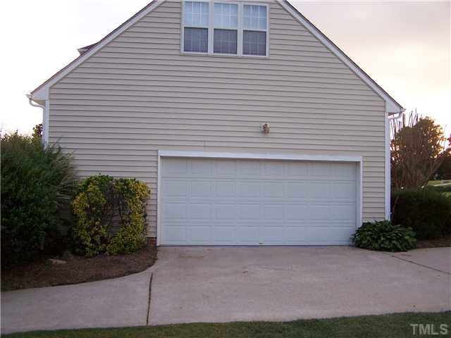 1155 Loop Road Clayton, NC 27527 - Photo 19 of 20 SIDE ENTRY GARAGE WITH EXTRA SPACE