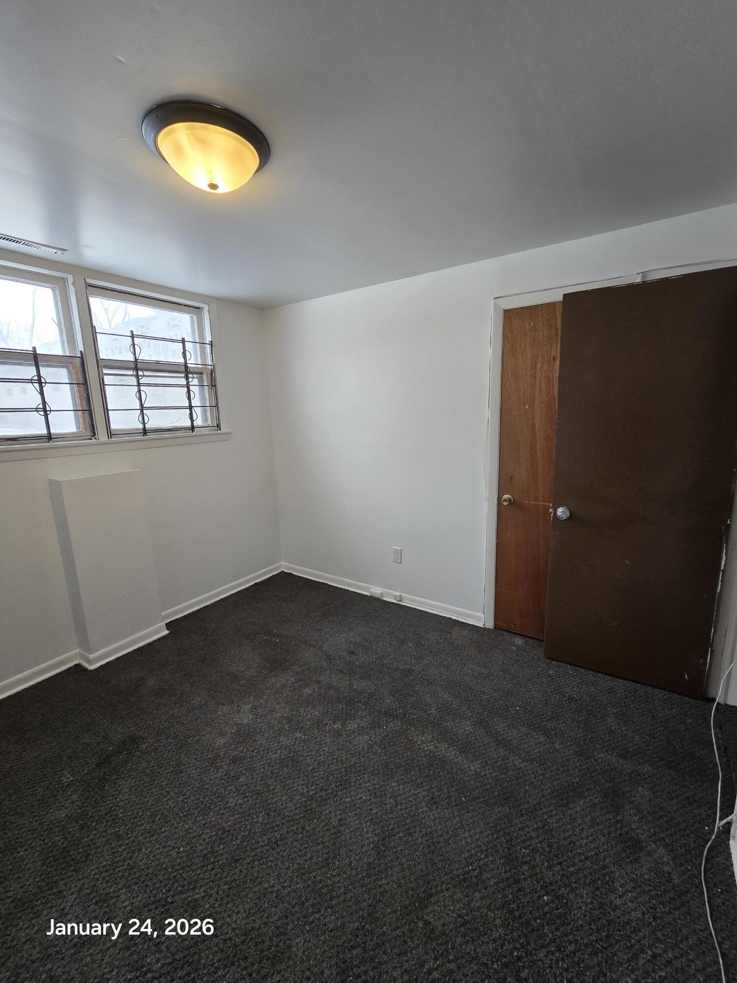 1676 West 13th Avenue Gary, IN 46404 - Photo 11 of 12 an empty room with a window