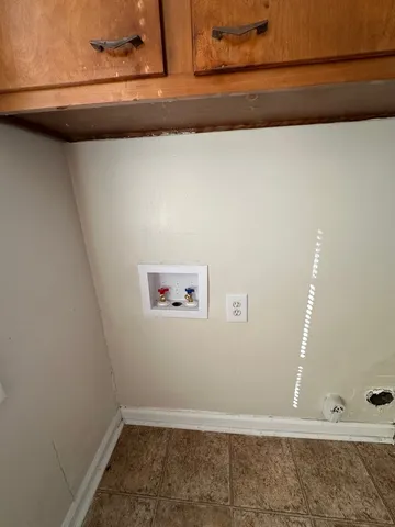 a bathroom with a shower and a toilet