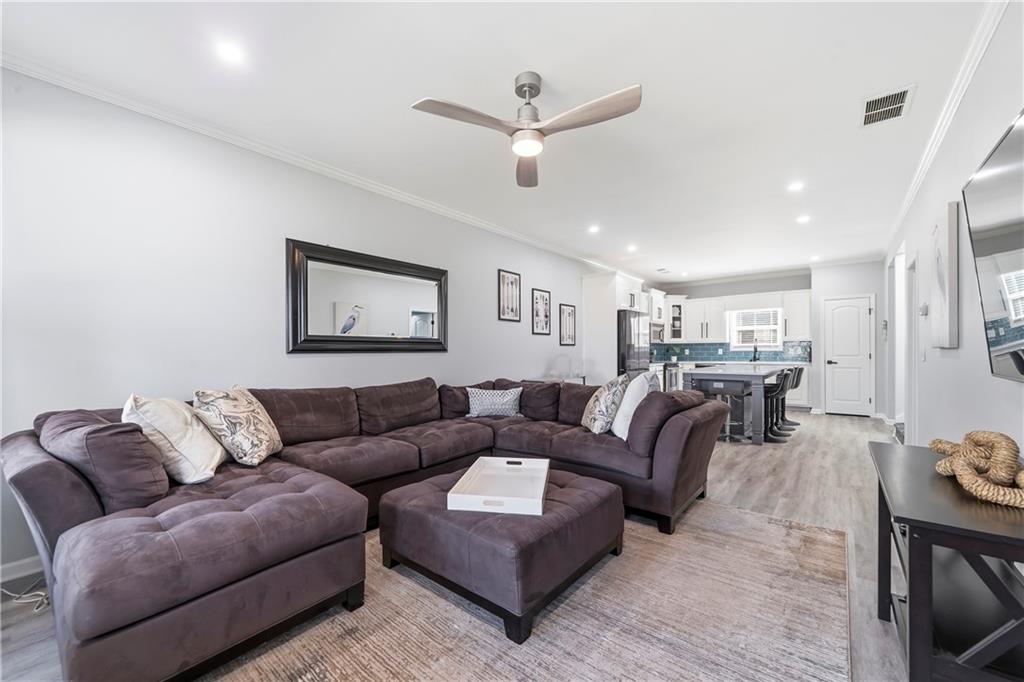 549 Old Phoenix Road Northeast, Unit 104 Eatonton, GA 31024 - Photo 12 of 49 a living room with furniture