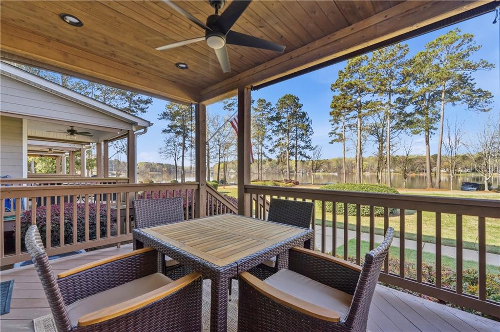 549 Old Phoenix Road Northeast, Unit 104 Eatonton, GA 31024 - Photo 19 of 49 a view of a balcony with furniture