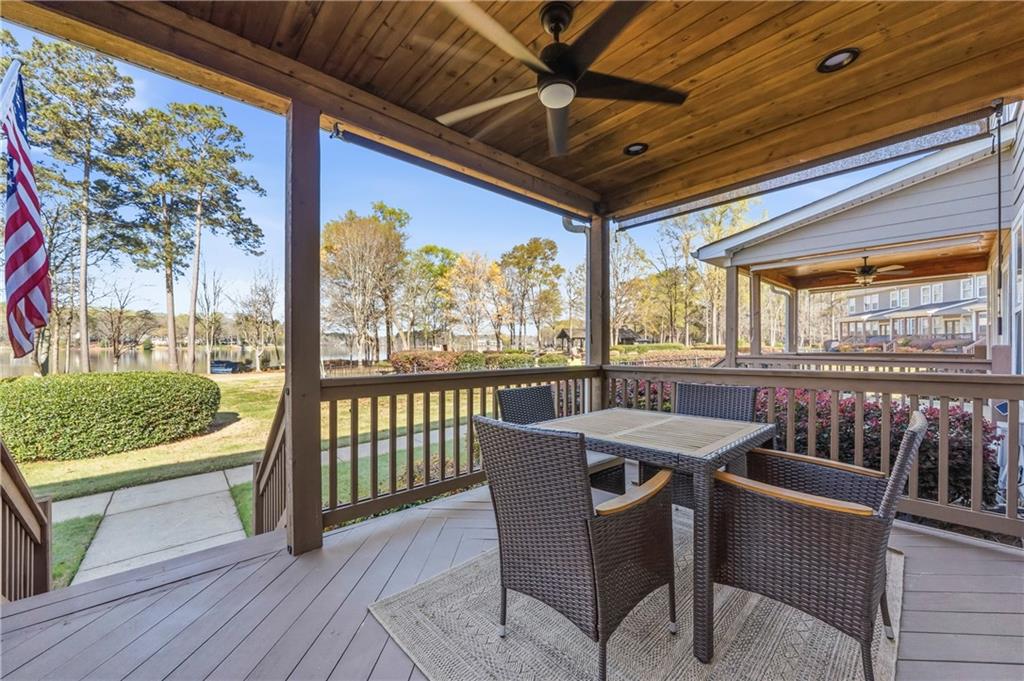 549 Old Phoenix Road Northeast, Unit 104 Eatonton, GA 31024 - Photo 3 of 49 a view of a porch with furniture and a yard