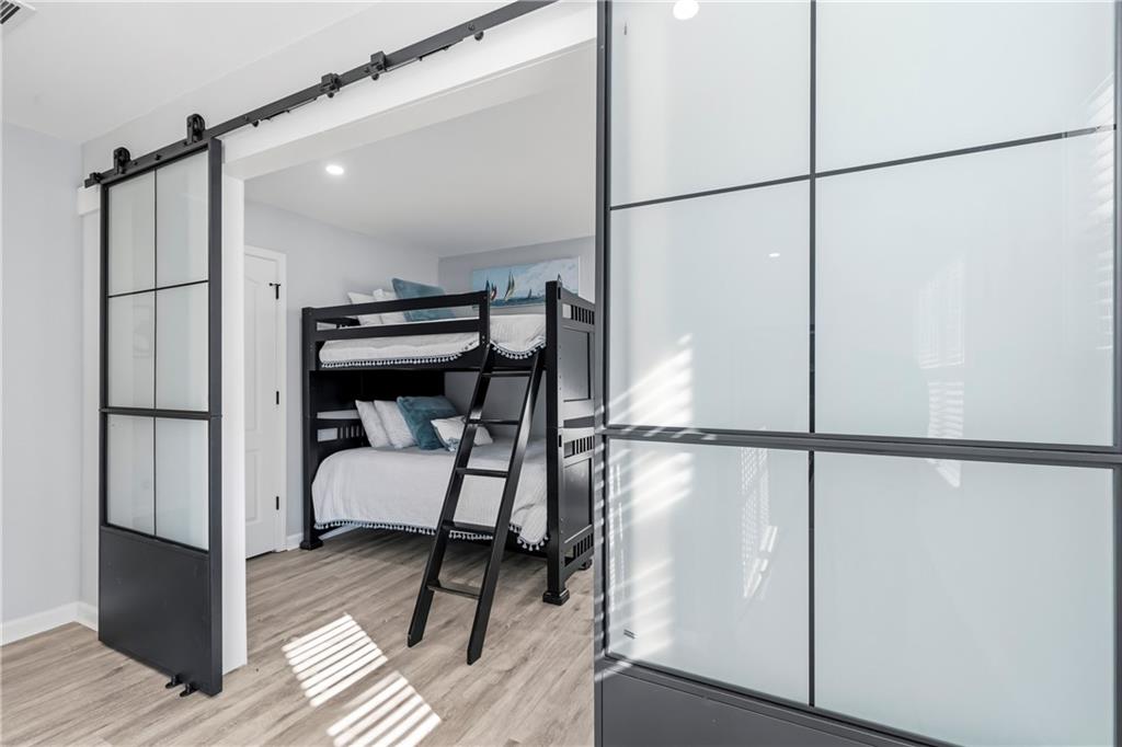 549 Old Phoenix Road Northeast, Unit 104 Eatonton, GA 31024 - Photo 33 of 49 a view of entryway with wooden floor