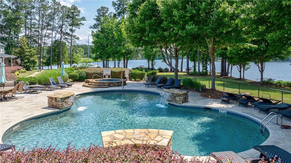 549 Old Phoenix Road Northeast, Unit 104 Eatonton, GA 31024 - Photo 37 of 49 a view of a garden with patio