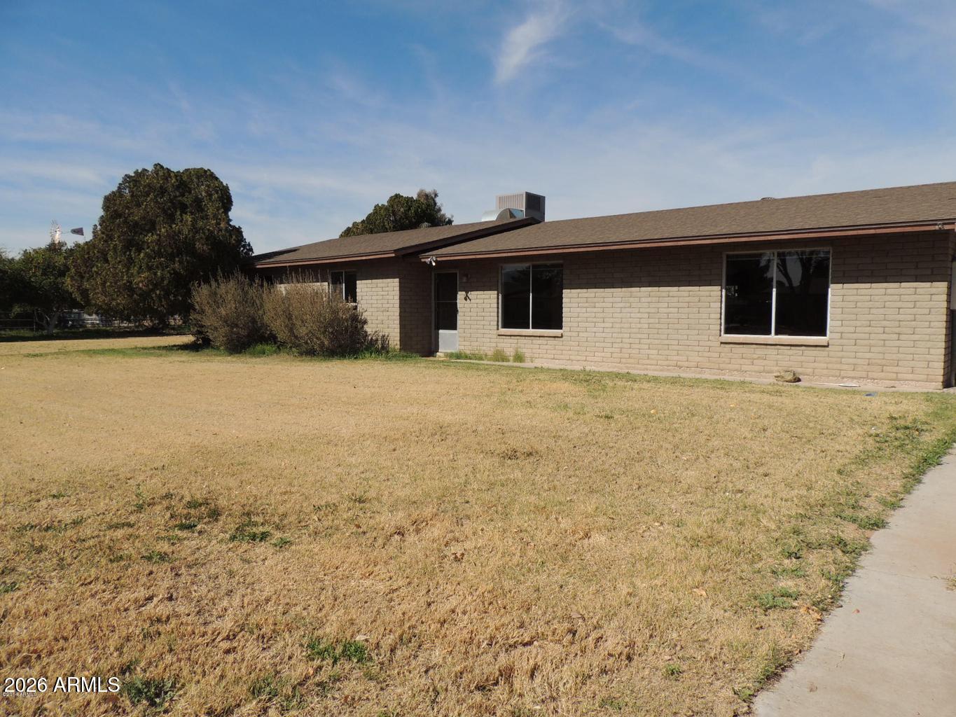 6508 West Fremont Road Laveen, AZ 85339 - Photo 4 of 32 a house with yard