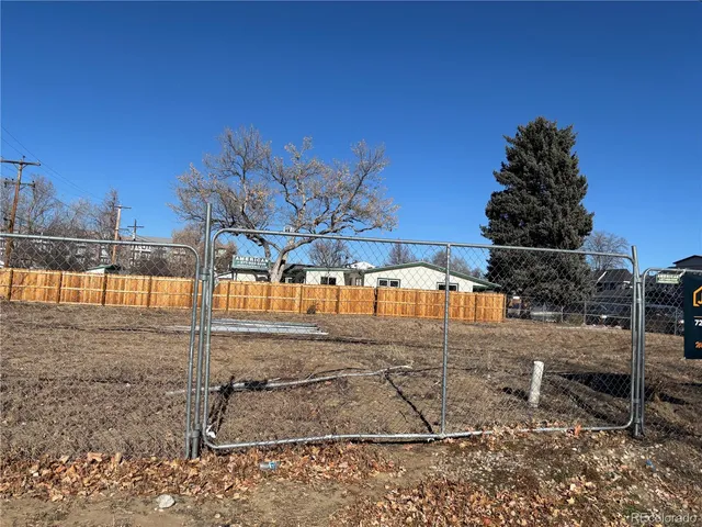 a view of a backyard of the house