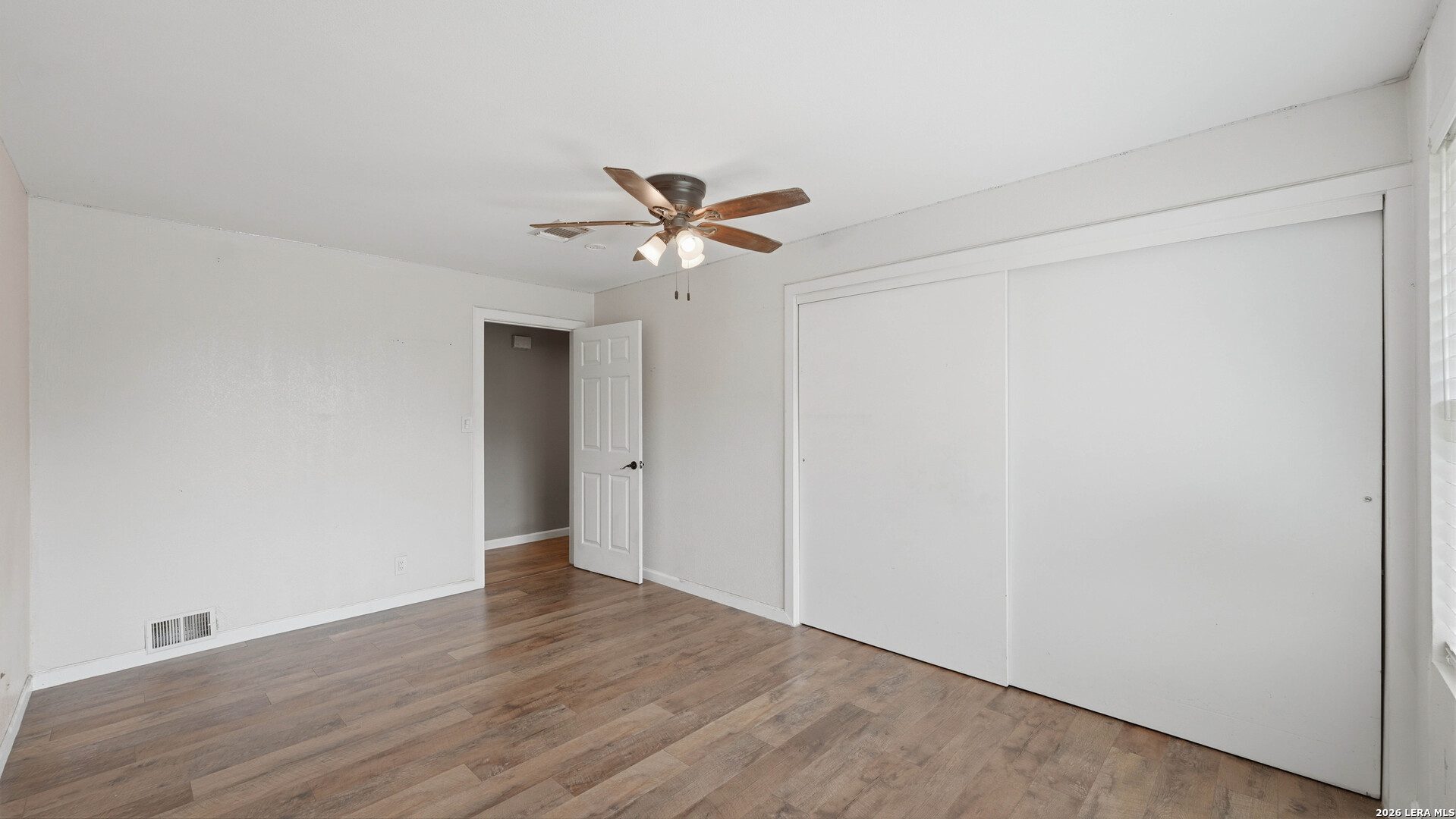 106 County Road 6611 Devine, TX 78016 - Photo 16 of 29 a view of an empty room with a window