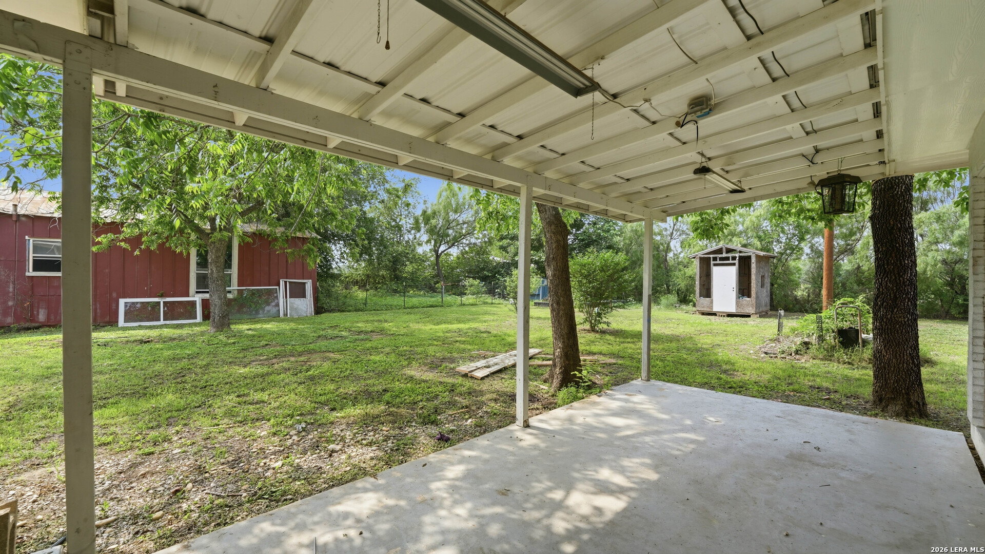 106 County Road 6611 Devine, TX 78016 - Photo 24 of 29 a view of a back yard