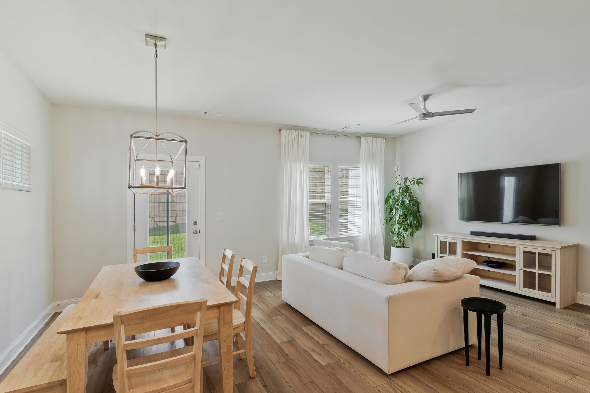 4669 Ridge Bend Drive Nashville, TN 37207 - Photo 11 of 33 a living room with furniture and a flat screen tv