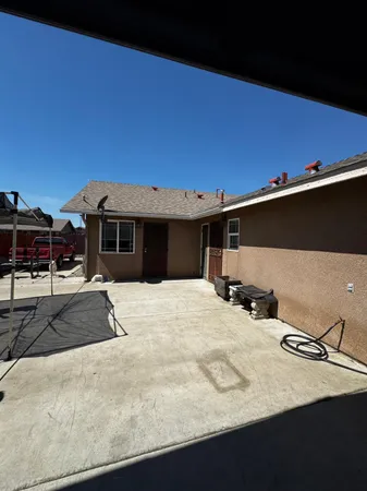a front view of a house with roof