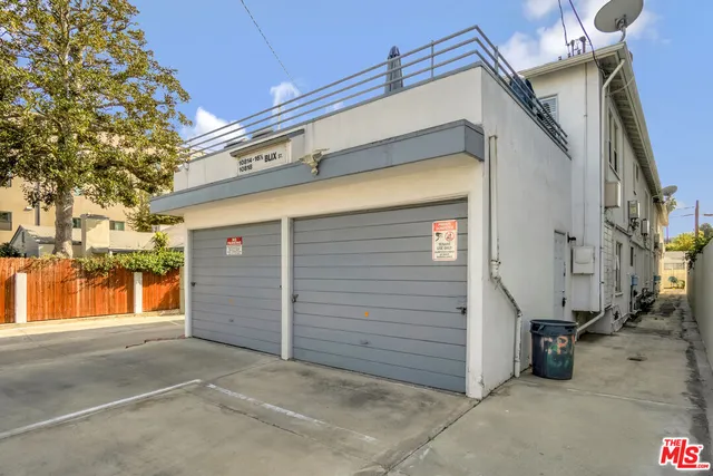 a front view of a building with garden