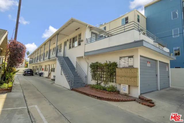 a view of a building with a street