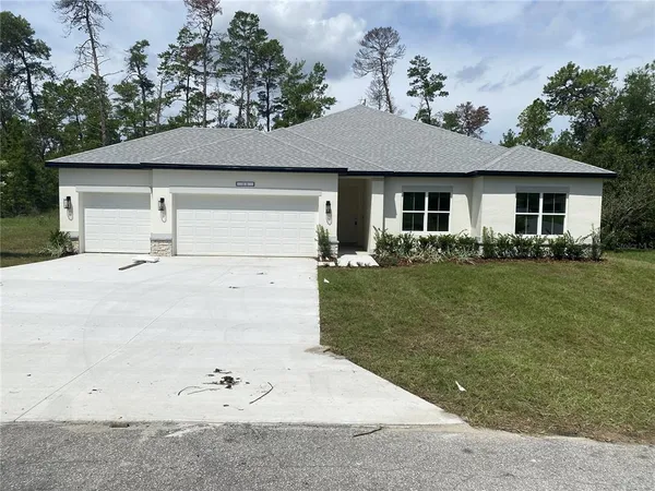 front view of house with a yard
