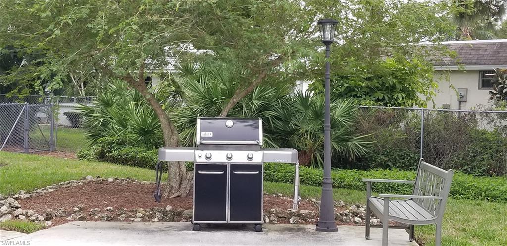 91 Georgetown Boulevard, Unit 91 Naples, FL 34112 - Photo 15 of 22 Community Weber Gas Grill