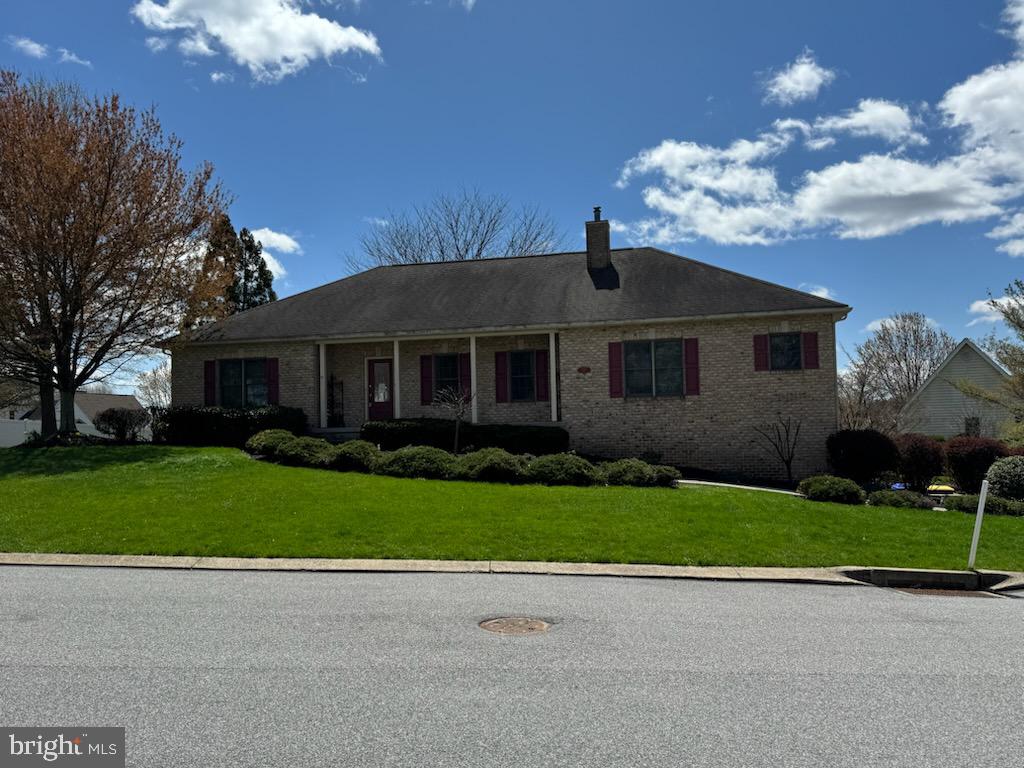 1807 Sorrel Ridge Road New Freedom, PA 17349 - Photo 1 of 1 a front view of a house with a yard and garage