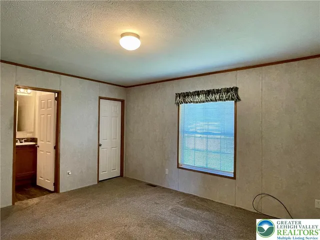 a bathroom with a sink a toilet and bathtub