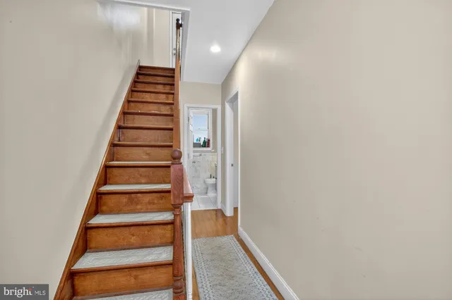 a view of entryway with wooden floor