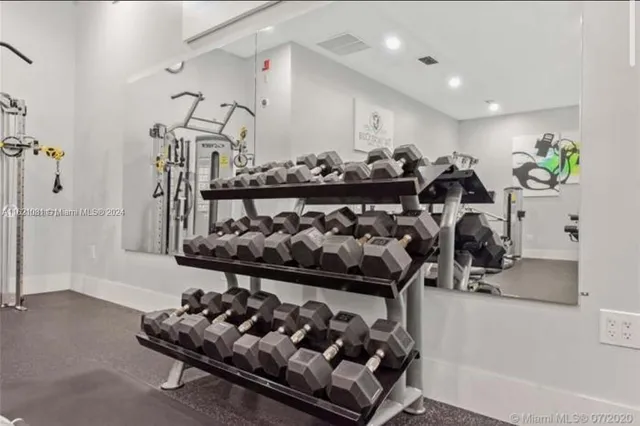 a view of a room with gym equipment