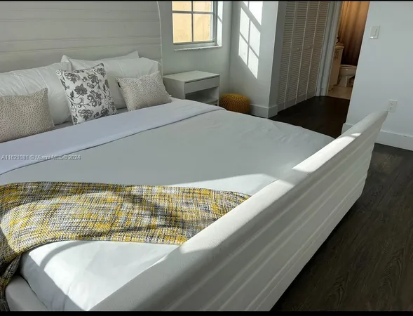 a view of balcony with furniture