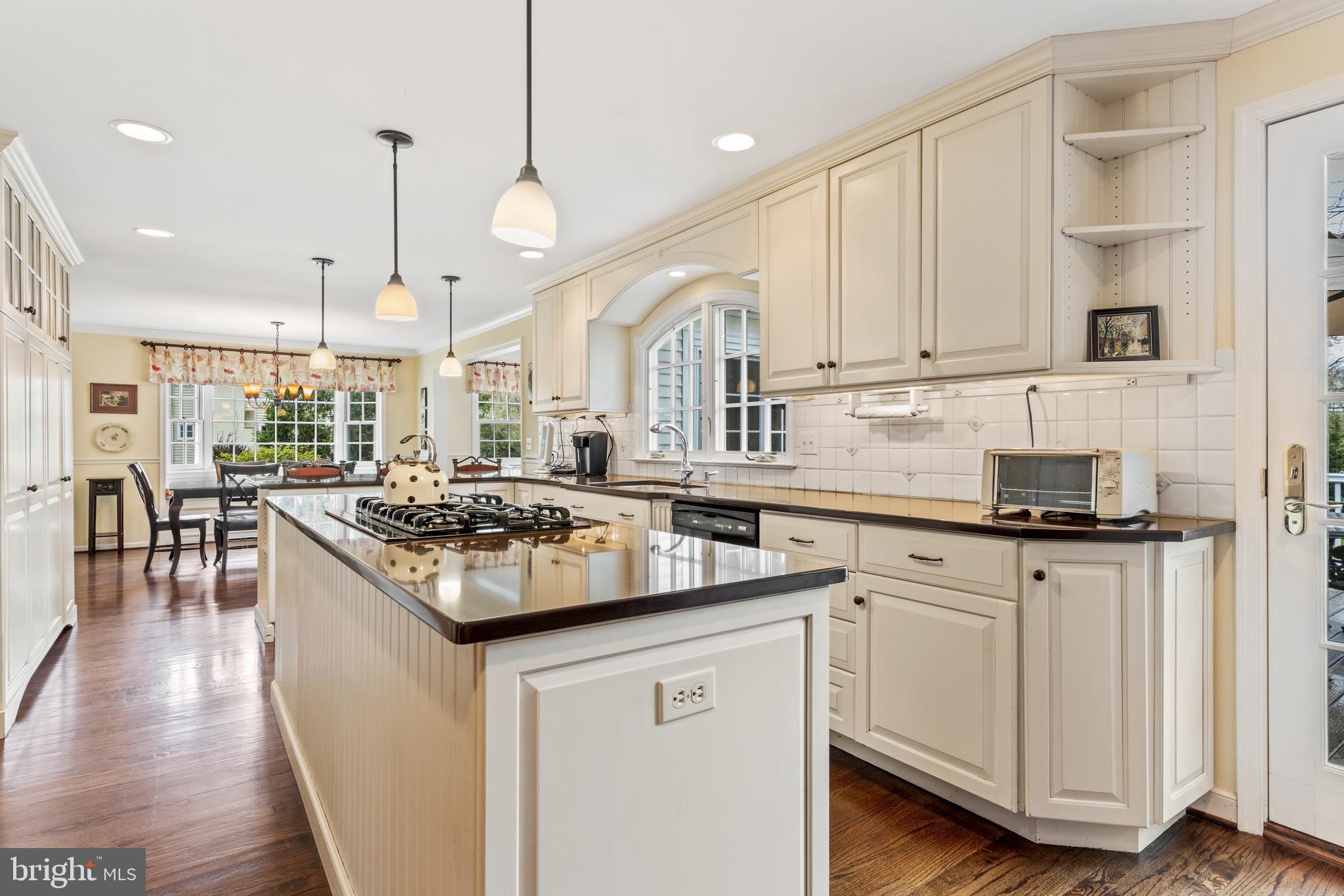 392 Yorkshire Road Bryn Mawr, PA 19010 - Photo 12 of 35 Island has pendant lights & gas downdraft cooktop