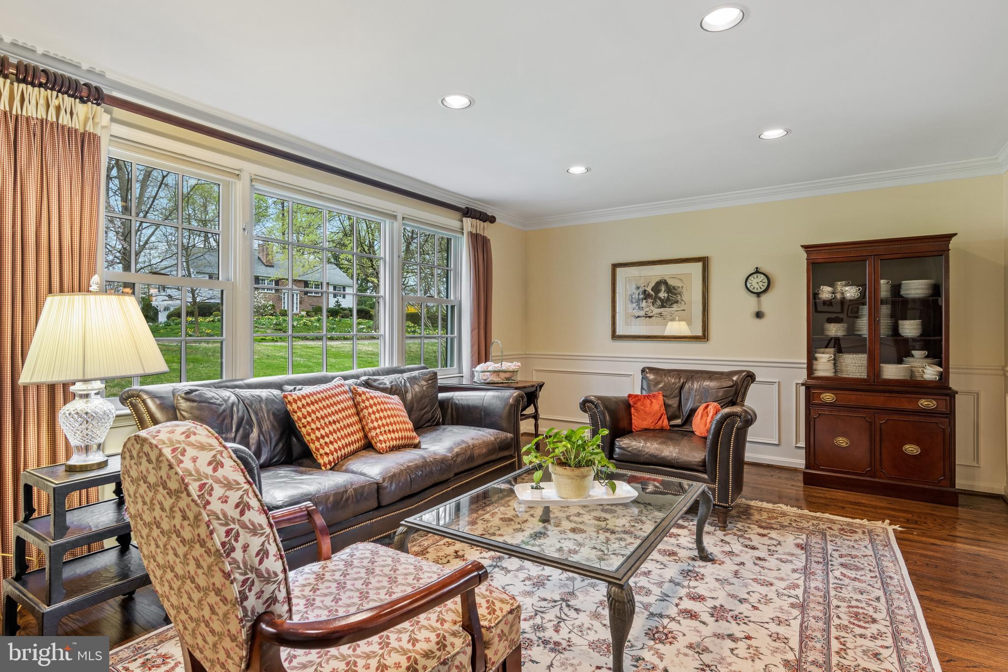392 Yorkshire Road Bryn Mawr, PA 19010 - Photo 18 of 35 Living Room has wainscoting & recessed lighting