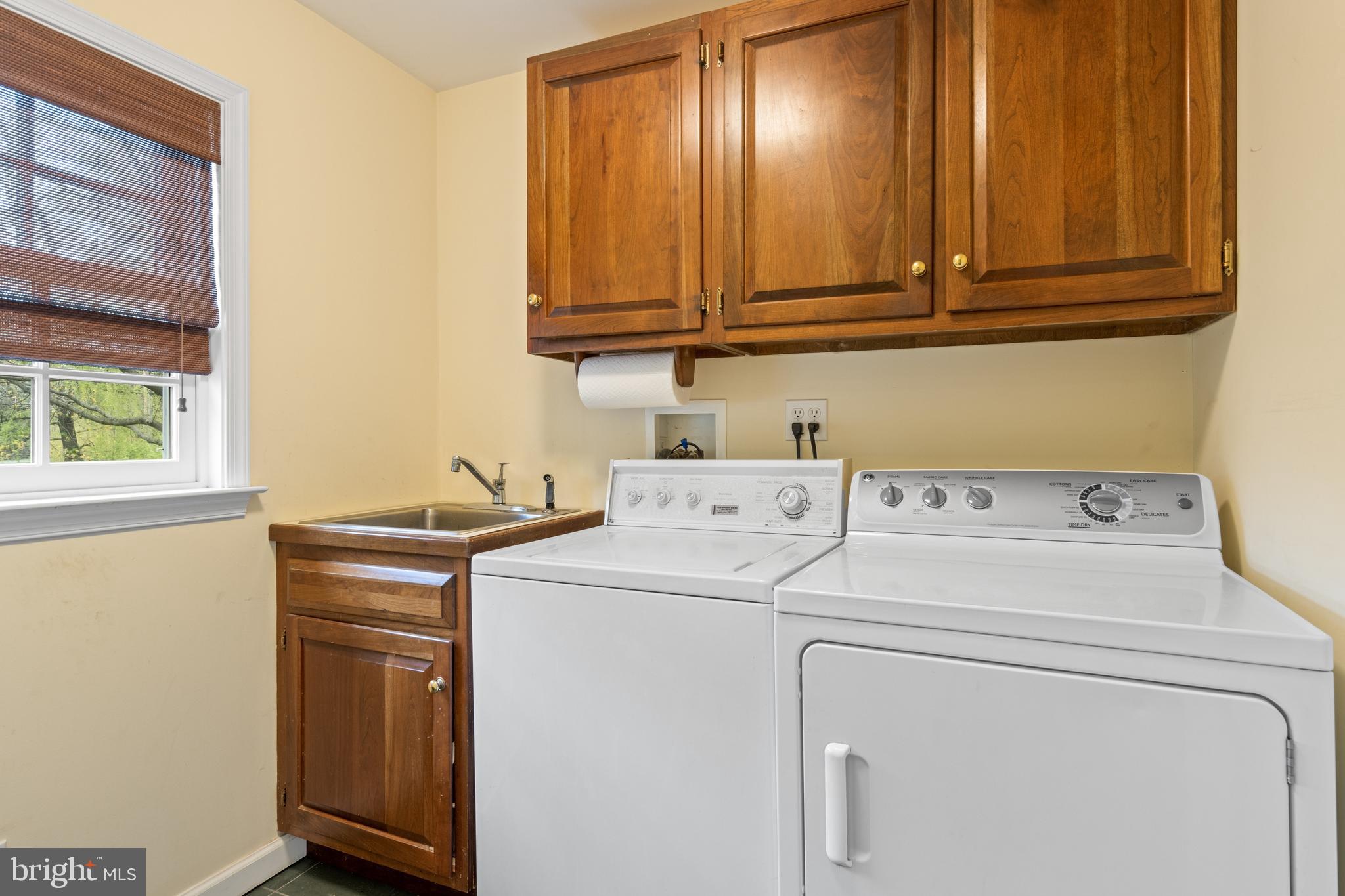 392 Yorkshire Road Bryn Mawr, PA 19010 - Photo 19 of 35 Main floor Laundry Room has door to rear yard