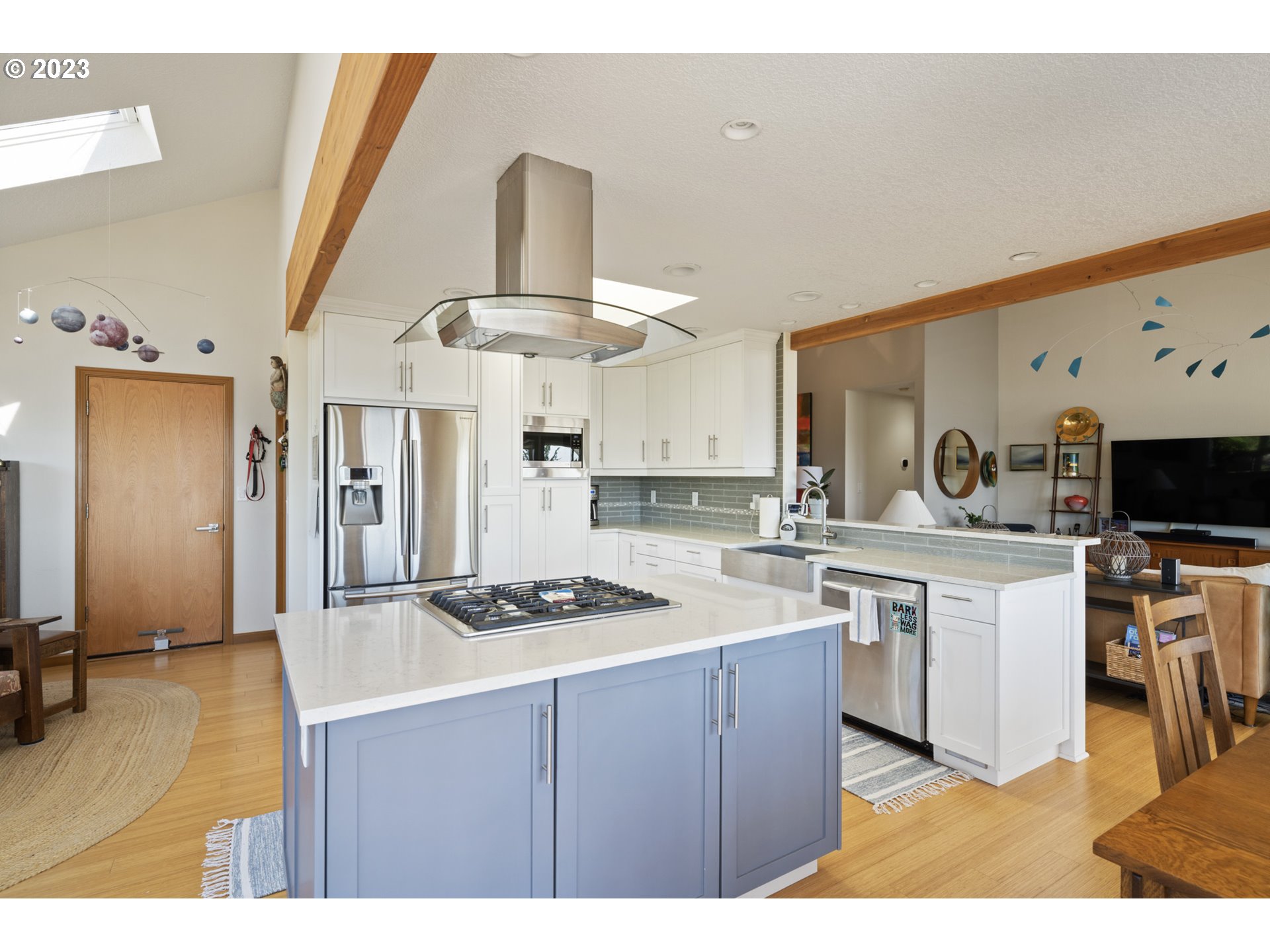 905 Pinewood West Tillamook, OR 97141 - Photo 12 of 44 a kitchen with stainless steel appliances granite countertop a sink a stove and a refrigerator
