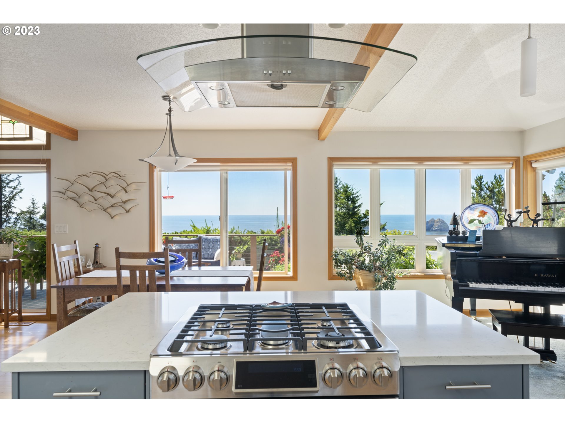 905 Pinewood West Tillamook, OR 97141 - Photo 15 of 44 a view of a dining room with furniture window and outside view
