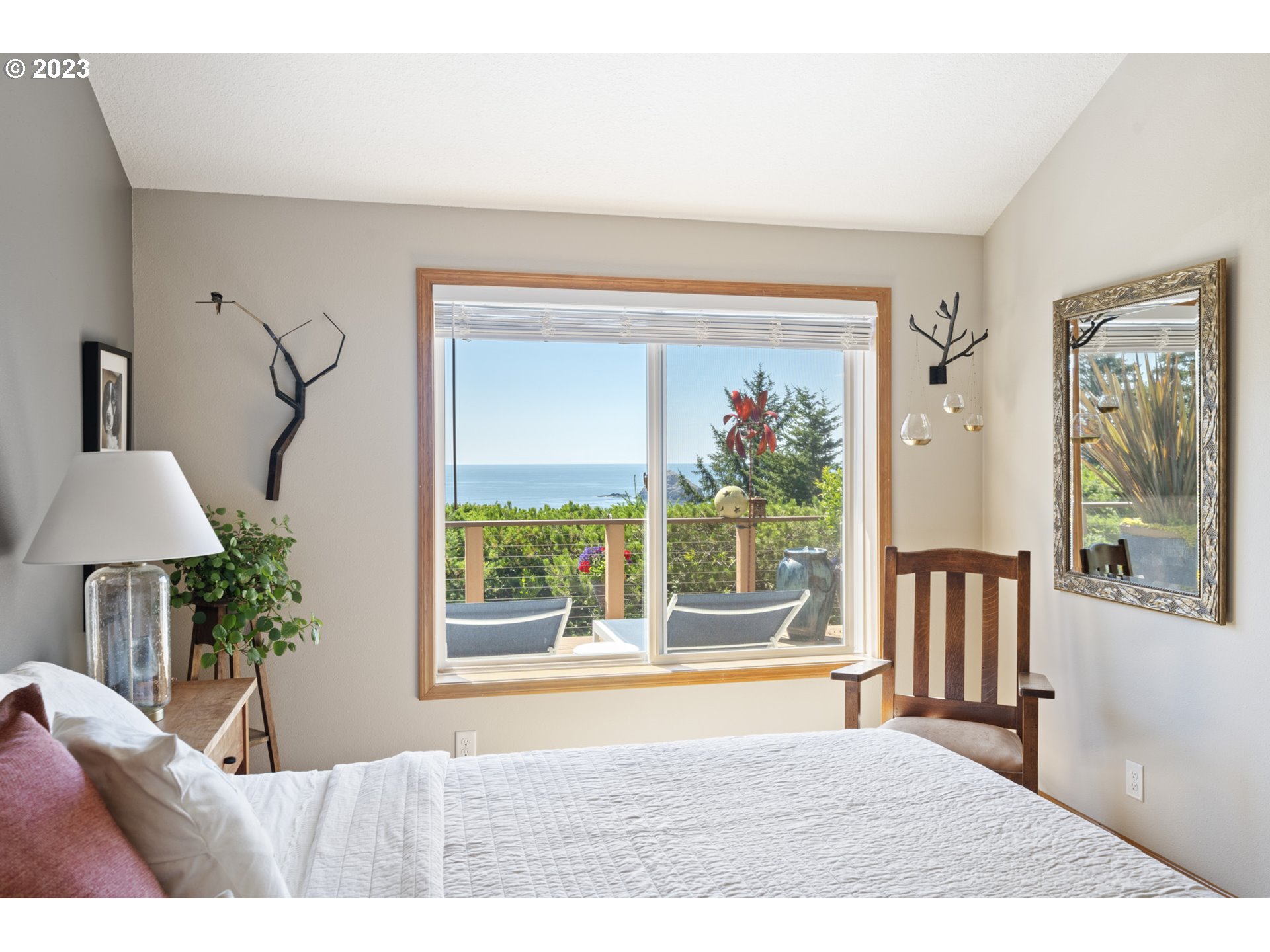 905 Pinewood West Tillamook, OR 97141 - Photo 21 of 44 a living room with furniture and a window