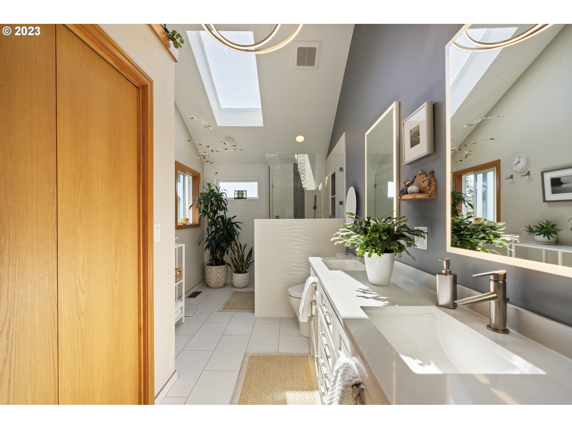 905 Pinewood West Tillamook, OR 97141 - Photo 22 of 44 a view of a living room and bathroom