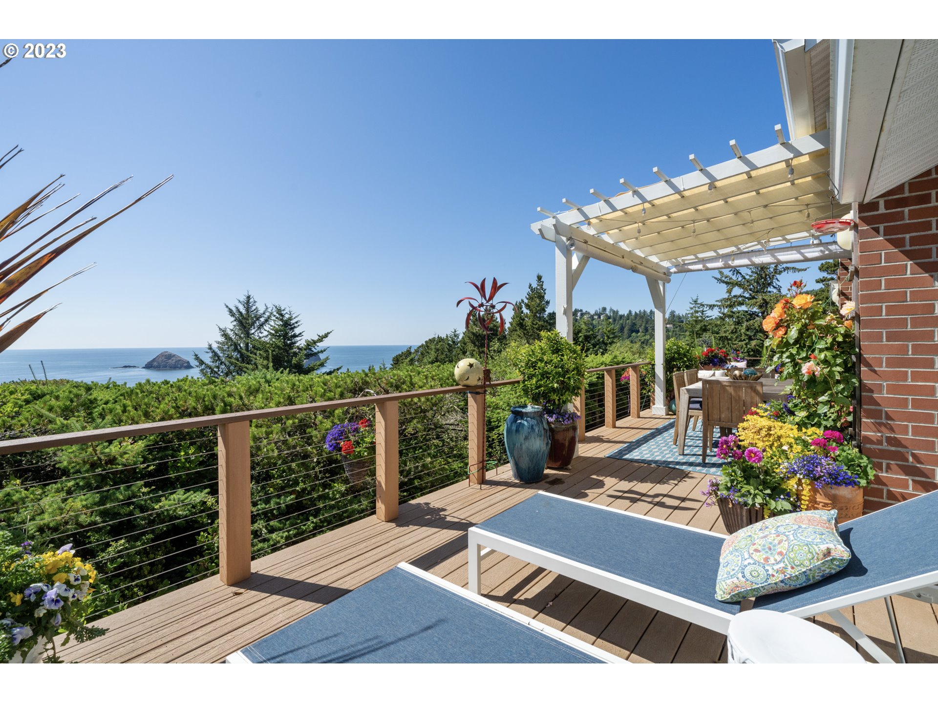 905 Pinewood West Tillamook, OR 97141 - Photo 3 of 44 a view of a backyard with plants