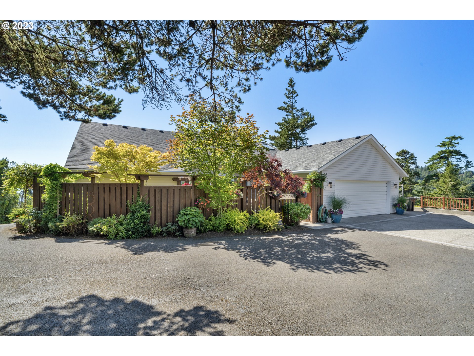 905 Pinewood West Tillamook, OR 97141 - Photo 31 of 44 a view of a backyard of the house