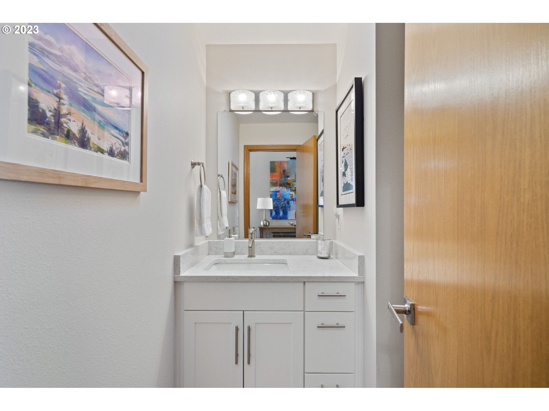 905 Pinewood West Tillamook, OR 97141 - Photo 33 of 44 a bathroom with a sink vanity and a mirror