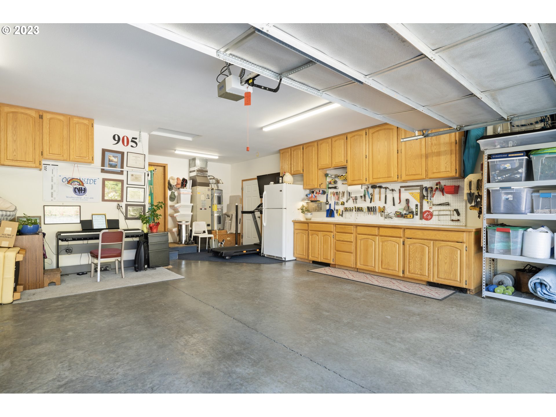905 Pinewood West Tillamook, OR 97141 - Photo 42 of 44 a living room with lots of furniture and a large window
