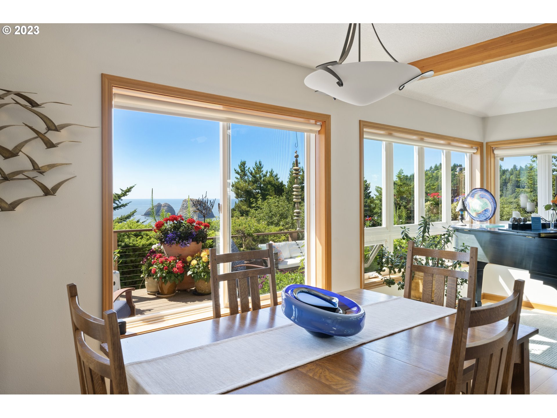 905 Pinewood West Tillamook, OR 97141 - Photo 7 of 44 a living room with furniture and a potted plant