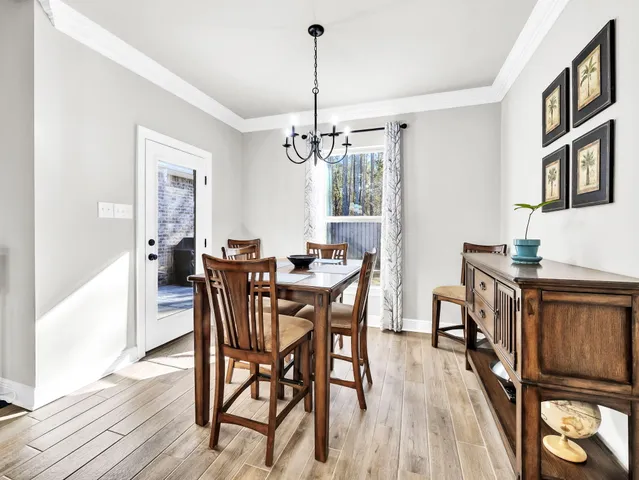 a white bath tub sitting next to a shower
