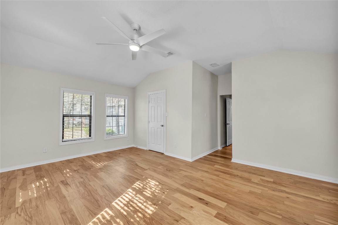 2403 South 3rd Street Austin, TX 78704 - Photo 21 of 29 a view of an empty room with wooden floor and fan