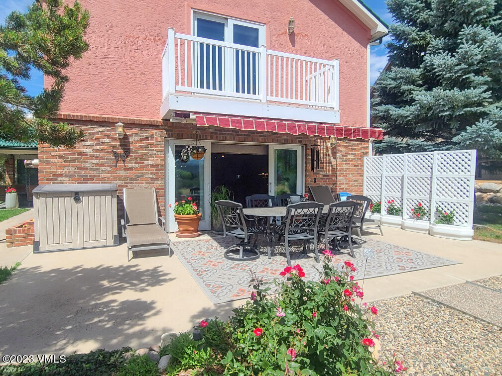 1072 Mesa Drive Eagle, CO 81631 - Photo 18 of 34 a backyard of a house with outdoor seating
