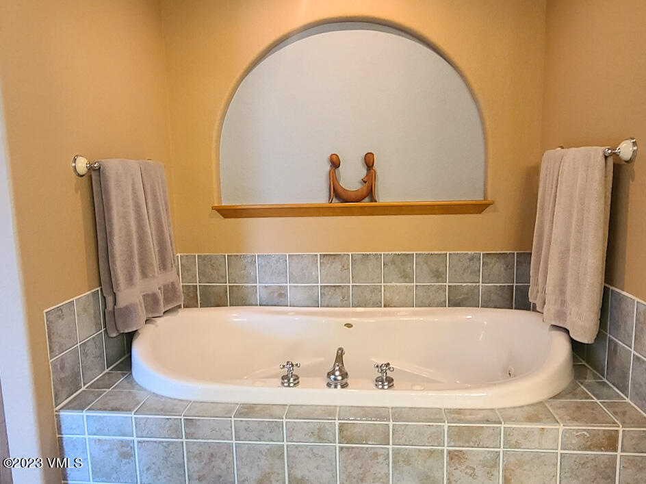 1072 Mesa Drive Eagle, CO 81631 - Photo 29 of 34 a view of a bath tub sitting in a bathroom