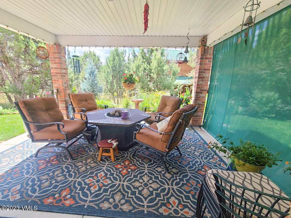 1072 Mesa Drive Eagle, CO 81631 - Photo 8 of 34 a outdoor living space with furniture and garden view