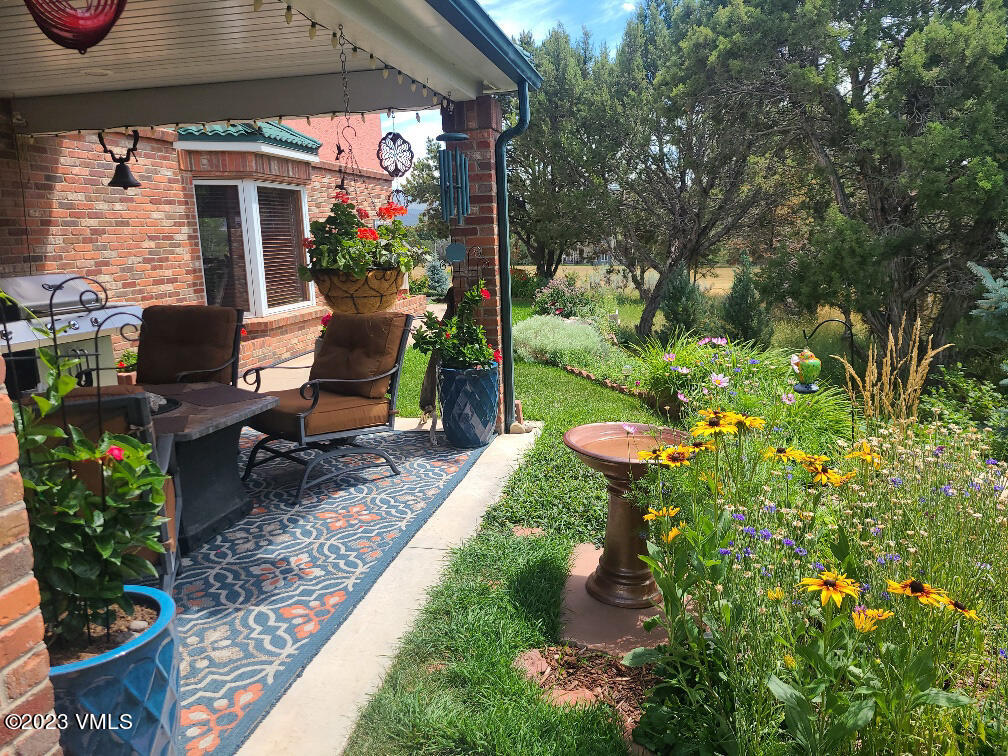 1072 Mesa Drive Eagle, CO 81631 - Photo 9 of 34 a view of a chairs and table in a patio
