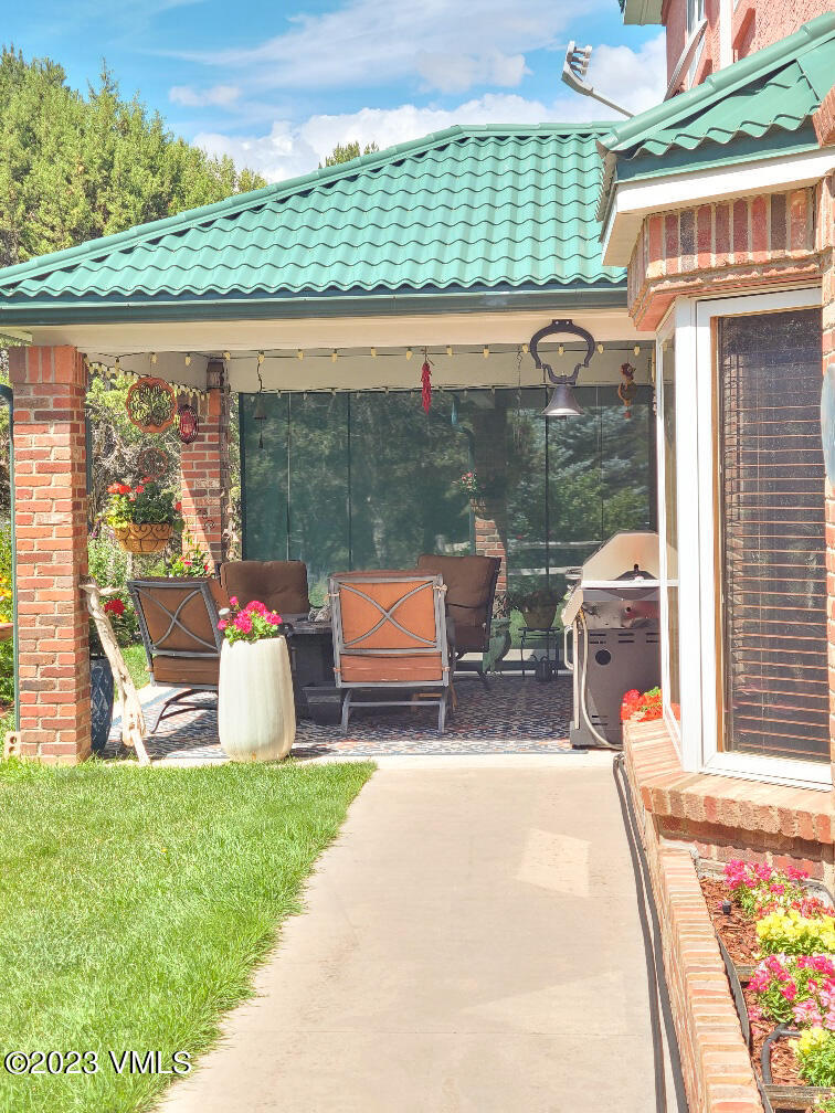 1072 Mesa Drive Eagle, CO 81631 - Photo 10 of 34 a view of a patio with a table and chairs