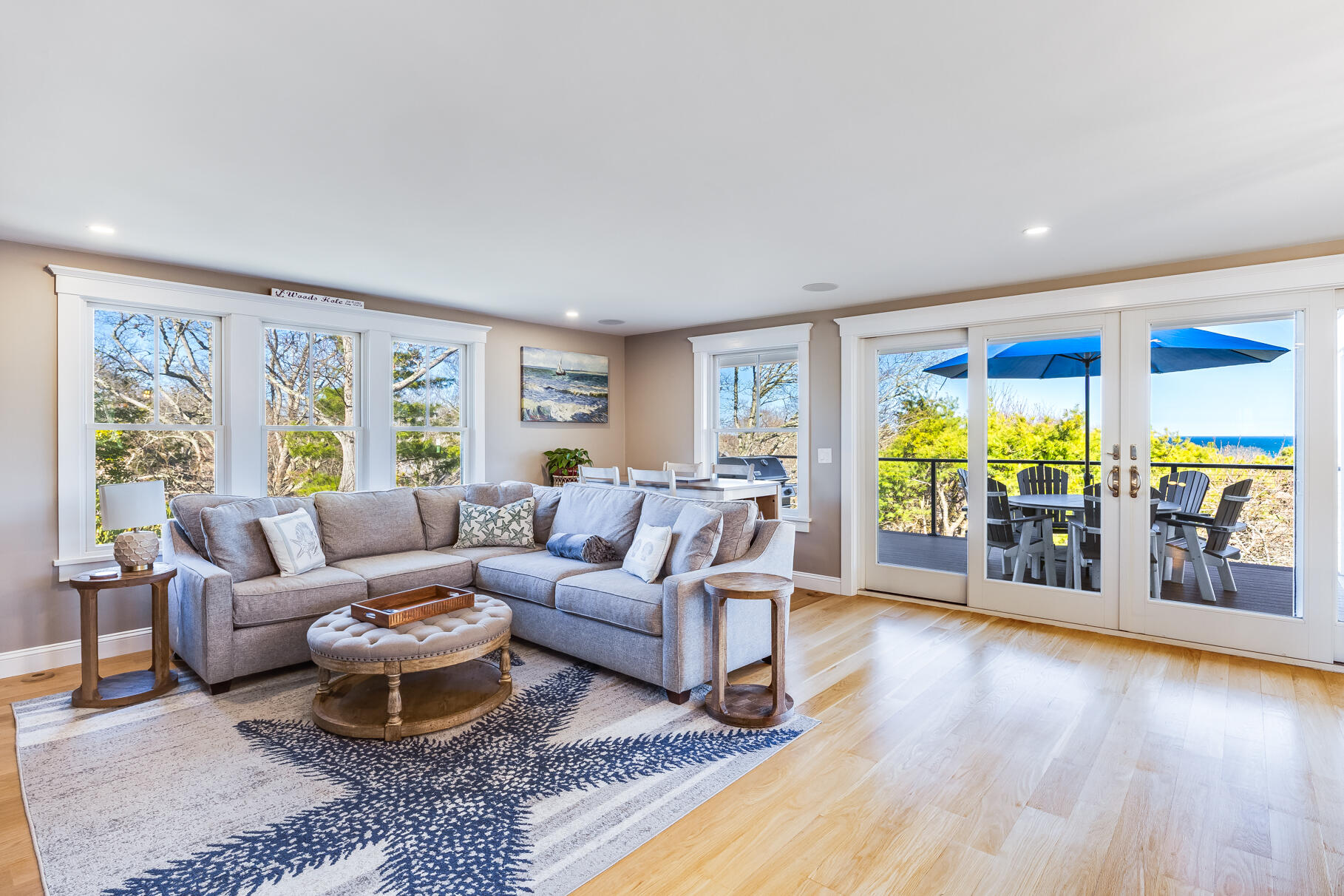 87 Oyster Pond Road Falmouth, MA 02540 - Photo 13 of 105 a living room with furniture and a large window
