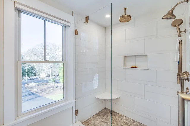 an outdoor space with furniture and umbrella