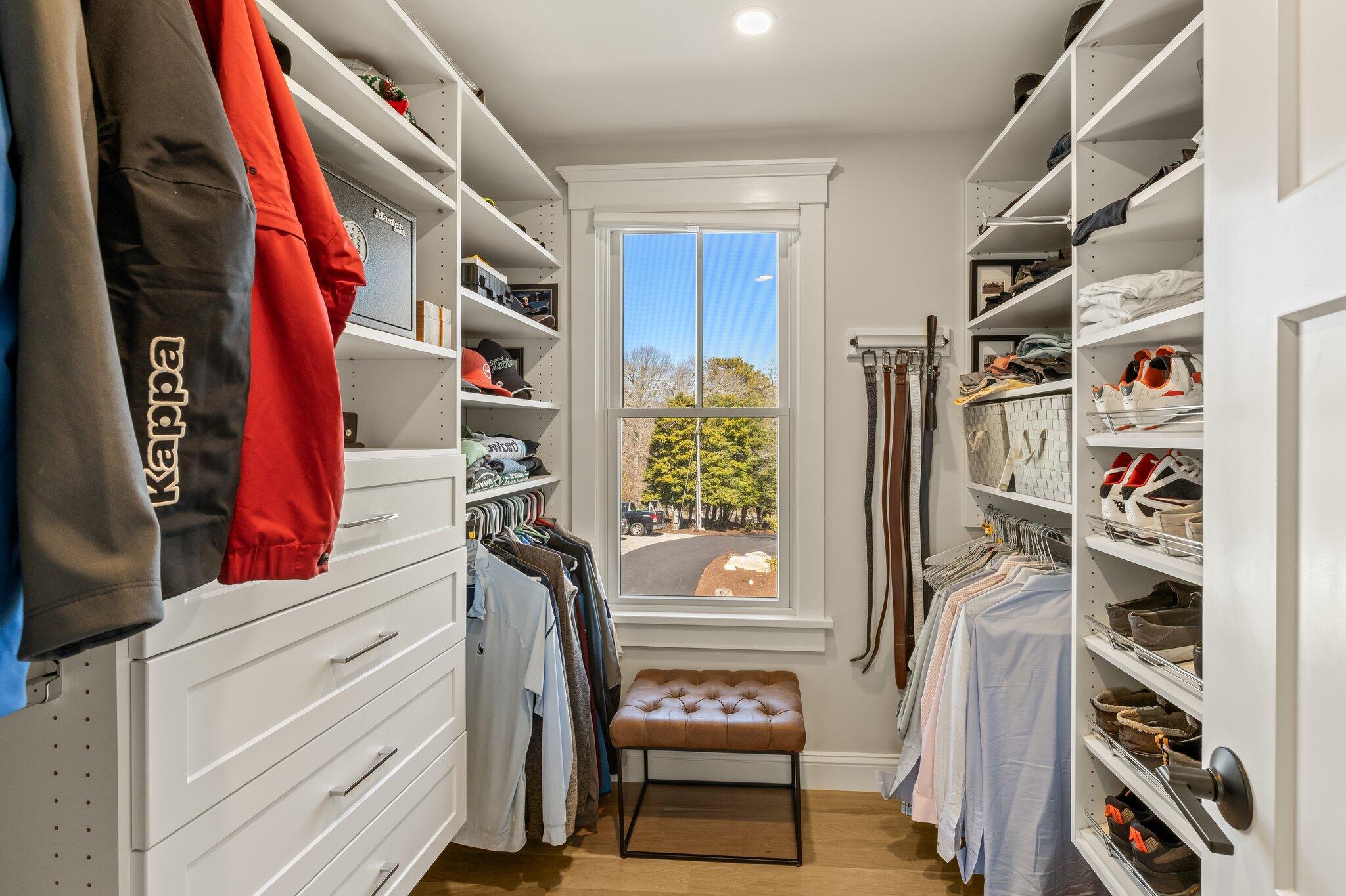 87 Oyster Pond Road Falmouth, MA 02540 - Photo 33 of 105 a view of walk in closet with clothes and shoes