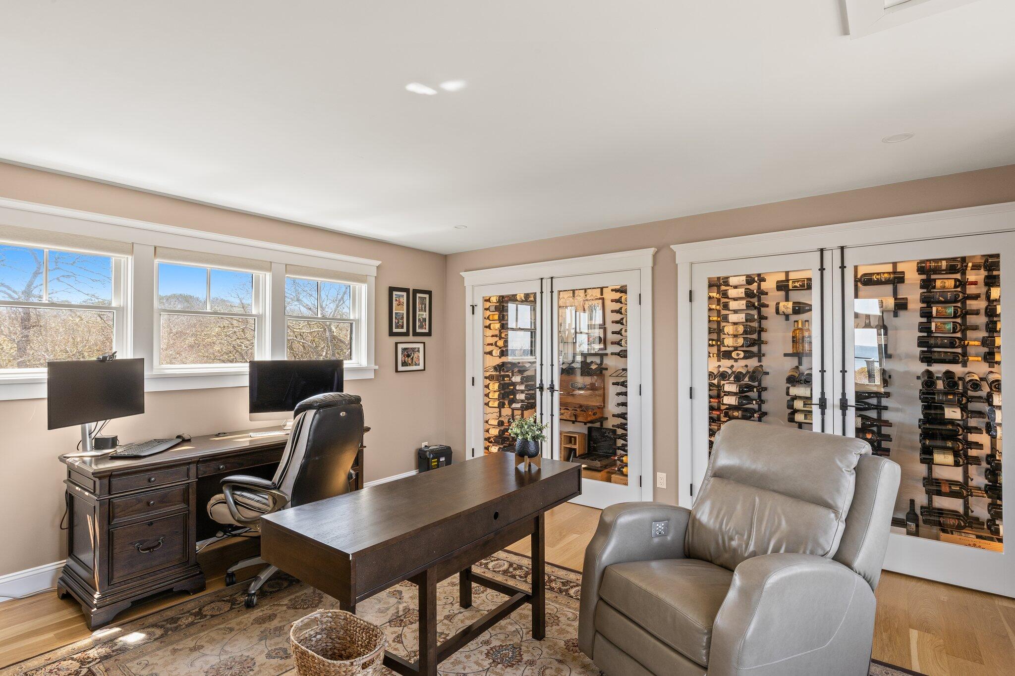 87 Oyster Pond Road Falmouth, MA 02540 - Photo 38 of 105 a view of a livingroom with workspace and a window