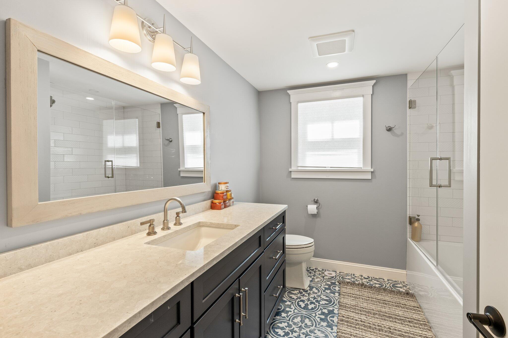 87 Oyster Pond Road Falmouth, MA 02540 - Photo 43 of 105 a bathroom with a sink and a mirror