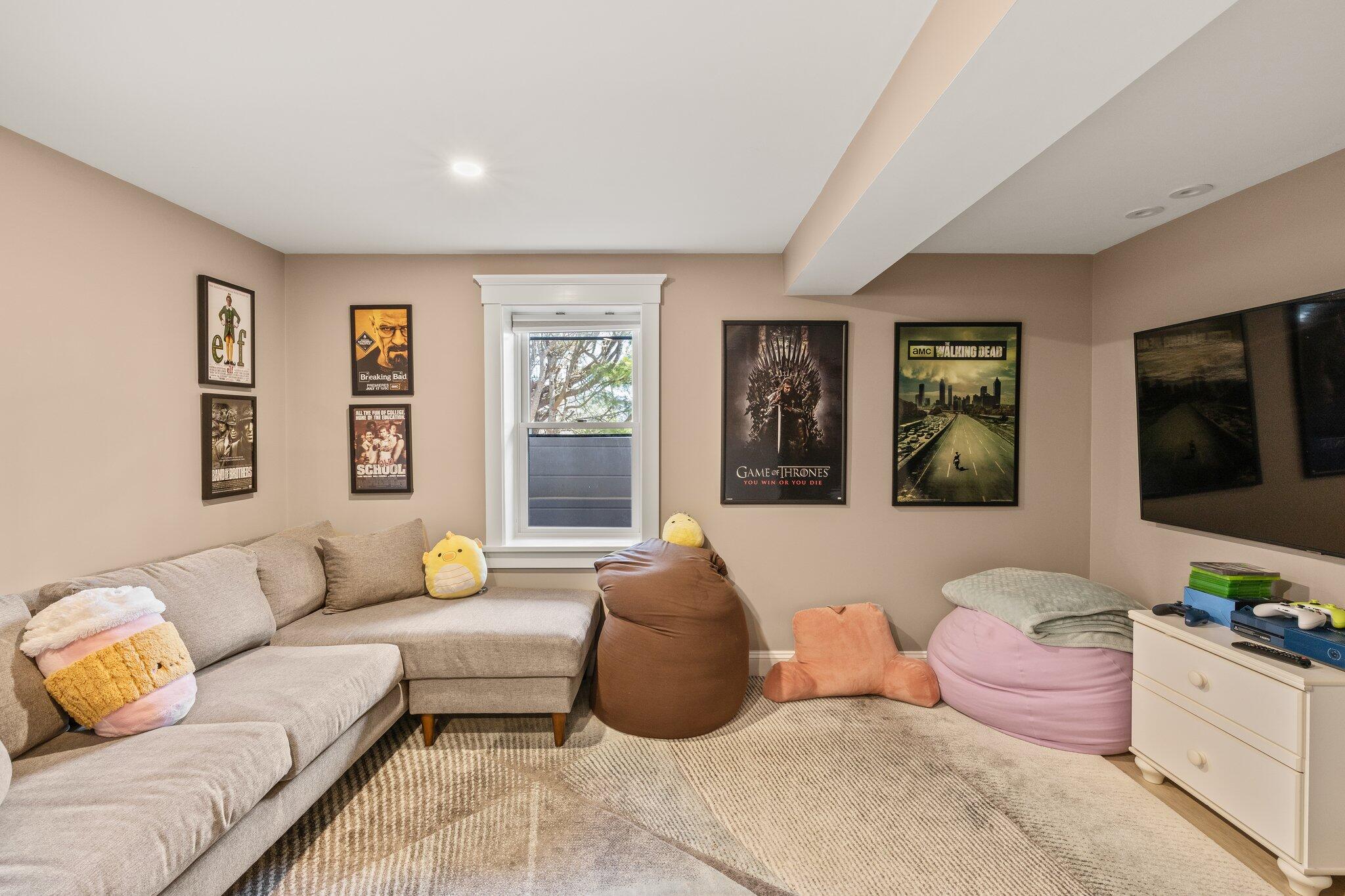 87 Oyster Pond Road Falmouth, MA 02540 - Photo 46 of 105 a living room with furniture large window and flat screen tv